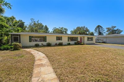 Front of home, sidewalk to side entrance | Image 3