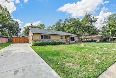 Ranch-style home featuring a front yard | Image 1