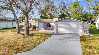 8139 Wooden Drive, House other with 3 bedrooms, 2 bathrooms and null parking in SPRING HILL FL | Image 1