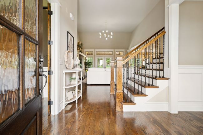 Welcome Home! Sand and finish Oak Floors with Walnut Stain, Fresh Neutral Color Pallet throughout, Upgraded mill work throughout - note baseboards, window trim, and door casing... | Image 6