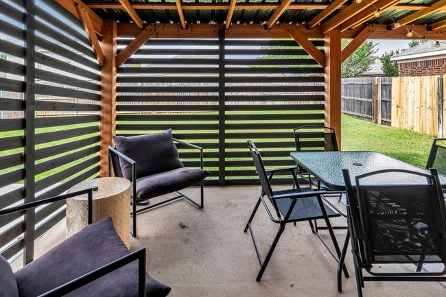 View of patio / terrace with fence and outdoor dining area | Image 27
