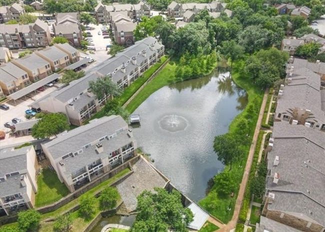 Aerial overview of property's location featuring nearby suburban area and a large body of water | Image 29