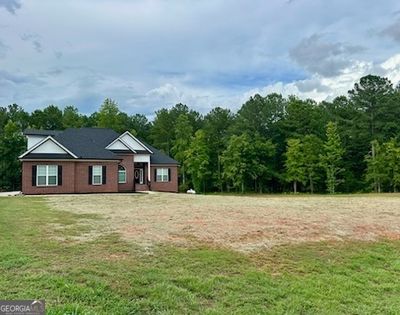 2594 Lassiter Road, House other with 3 bedrooms, 2 bathrooms and 4 parking in Forsyth GA | Image 1