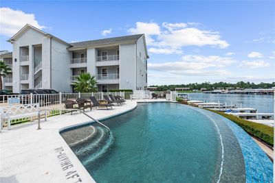 Enjoy lake living or home away from home in your condo on Lake Conroewith your own boat slip and lift to enjoy all the water sports. Dining and shopping are all close by! | Image 1