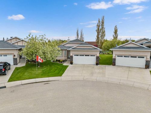 310 Riverside Gdns Nw, High River, AB, T1V1Y9 | Card Image