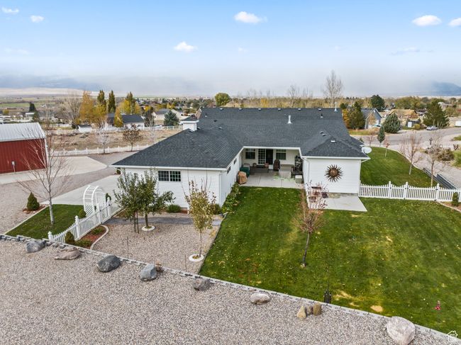 Back of house featuring a patio area and a lawn | Image 85