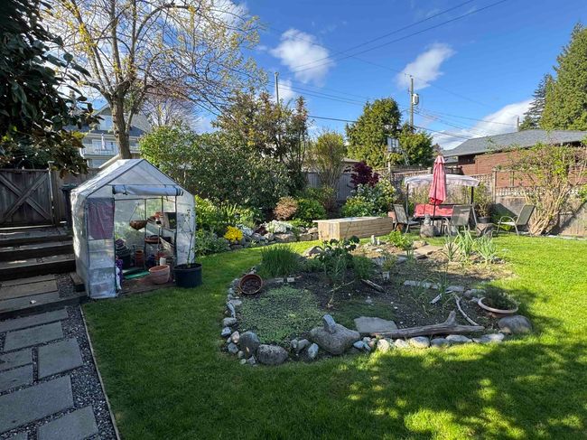 View of yard with fence | Image 7