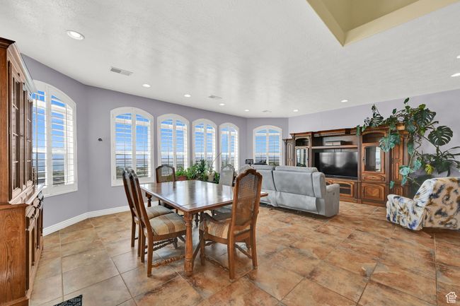 Dining space with baseboards, visible vents, and recessed lighting | Image 23