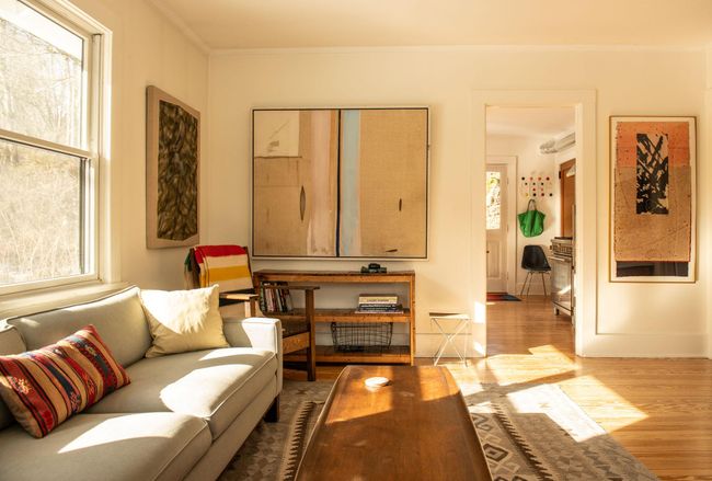 Living room with crown molding and light hardwood / wood-style floors | Image 6