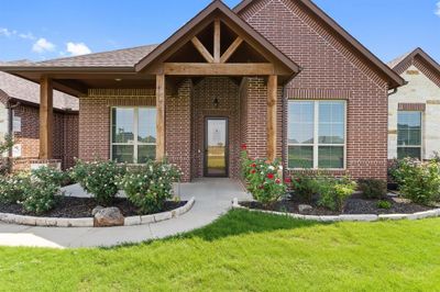 View of front of house with a front yard | Image 1