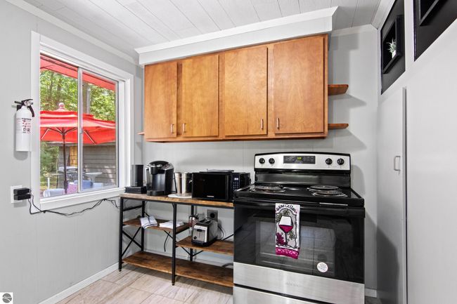 6015 Crystal Beach Rd Nw, House other with 4 bedrooms, 2 bathrooms and null parking in Rapid City MI | Image 16