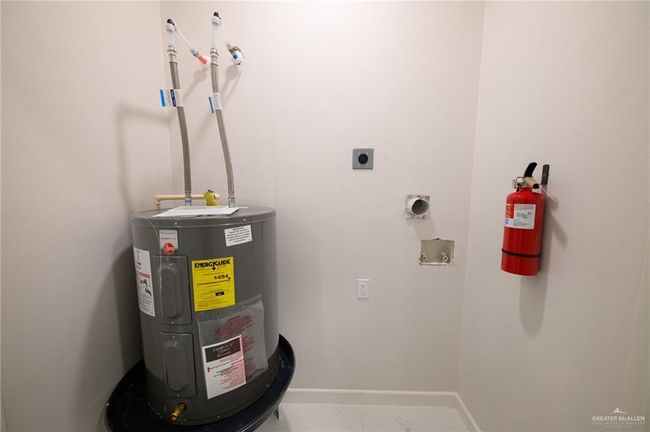 Utilities with electric water heater | Image 19
