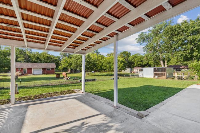 View of patio / terrace with view of scattered trees | Image 29