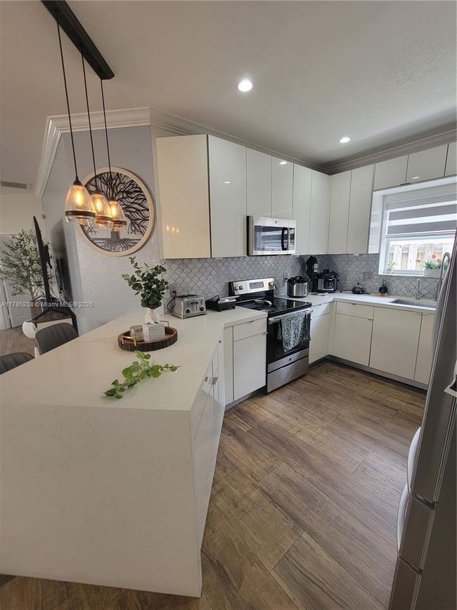 405 Ne 25 Th Ter, House other with 3 bedrooms, 2 bathrooms and null parking in Homestead FL | Image 18