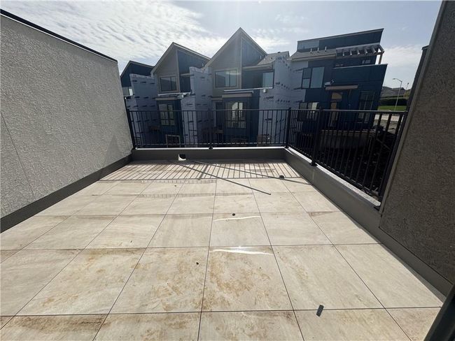 View of patio featuring a balcony | Image 25