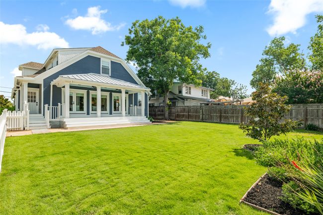 Large grassy backyard, plenty of room for play! | Image 34
