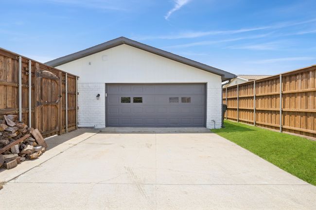 This 20x20 garage has a long driveway, too! | Image 35