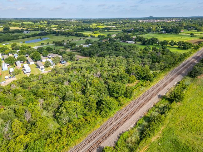 Aerial overview of property's location featuring a large body of water | Image 5