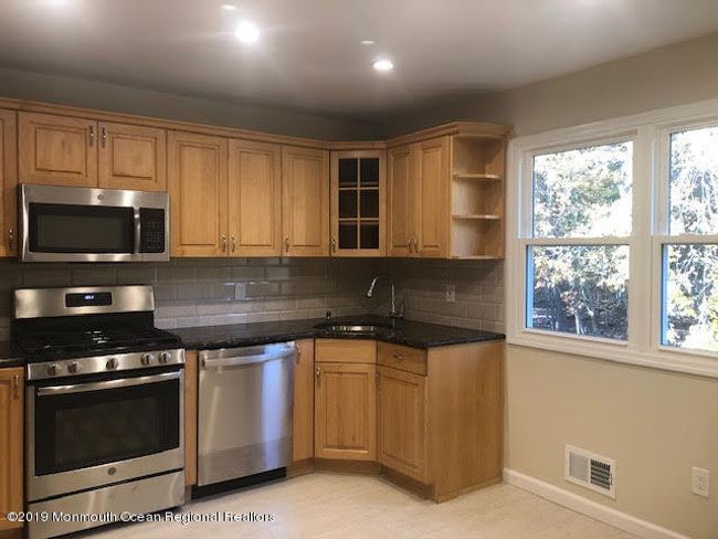 46 Dortmunder Dr, Townhouse with 4 bedrooms, 3 bathrooms and null parking in Manalapan NJ | Image 17