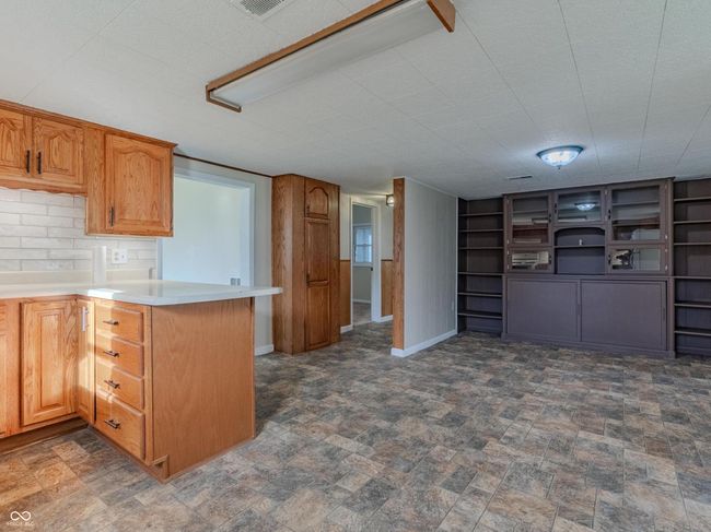 Kithen, back area is the dining area and china cabinet | Image 15