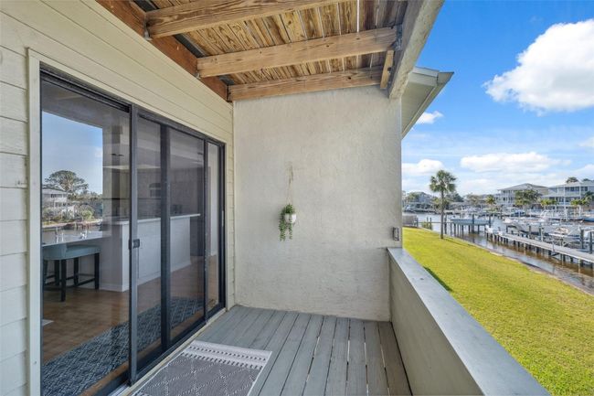 second floor balcony overlooking water | Image 37