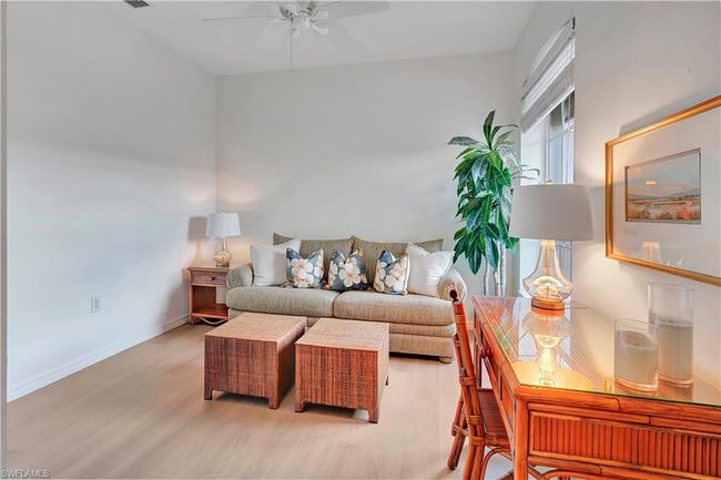 Den/3rd Bedroom with ceiling fan and light hardwood / wood-style flooring | Image 10