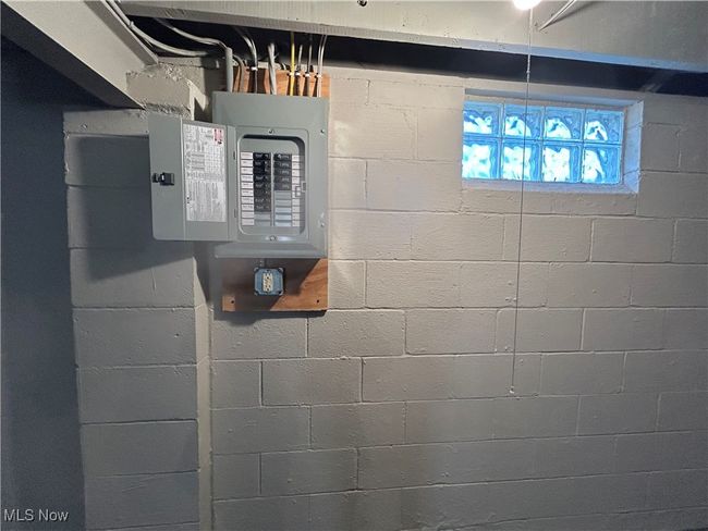 New electric panel and glass block windows. | Image 40