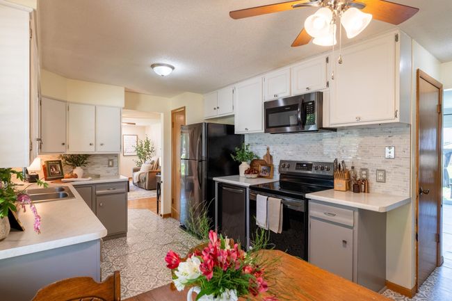 Great kitchen space with eat-in, stainless steel appliances & a pantry. | Image 7
