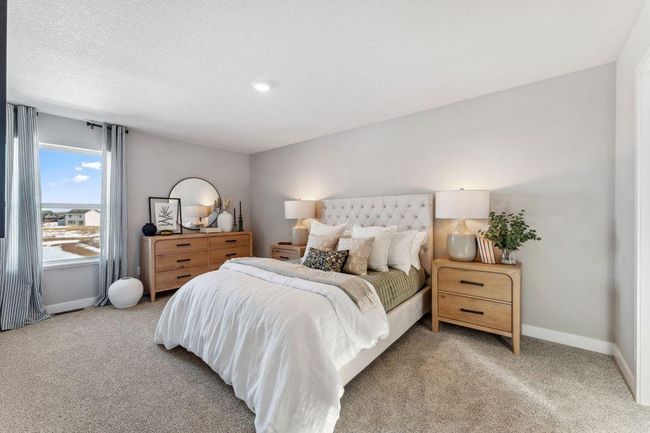 Bedroom #3 of 4 on upper level is a "Princess Suite" and has an attached HUGE walk in closet AND its own bathroom. Gorgeous! Photo of Model Home. Options and colors may vary. Ask Sales Agent for details. | Image 28