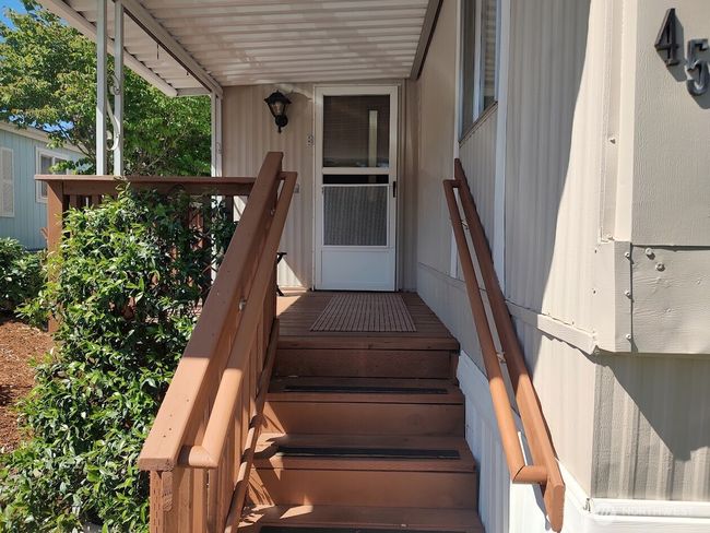 Front porch big enough for covered seating | Image 9