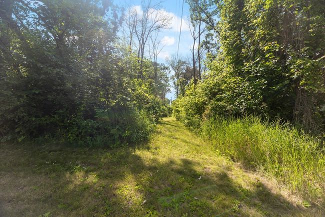 walking trail on between homes | Image 40