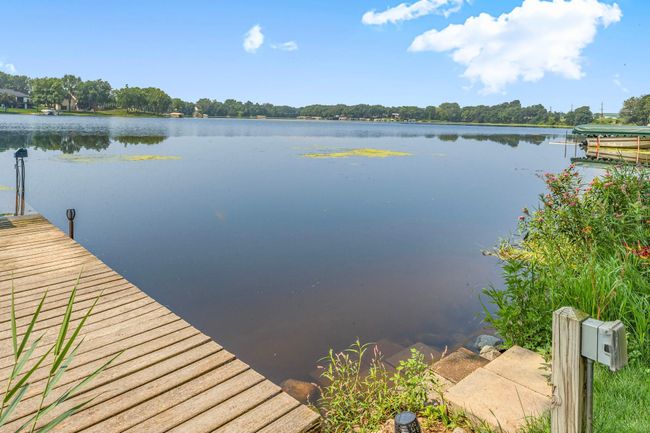 Notice the custom steps to the sandy bottom shoreline. Water is currently high, typically all 3 of the first steps are out of the water giving you a shallow sandy beach | Image 28