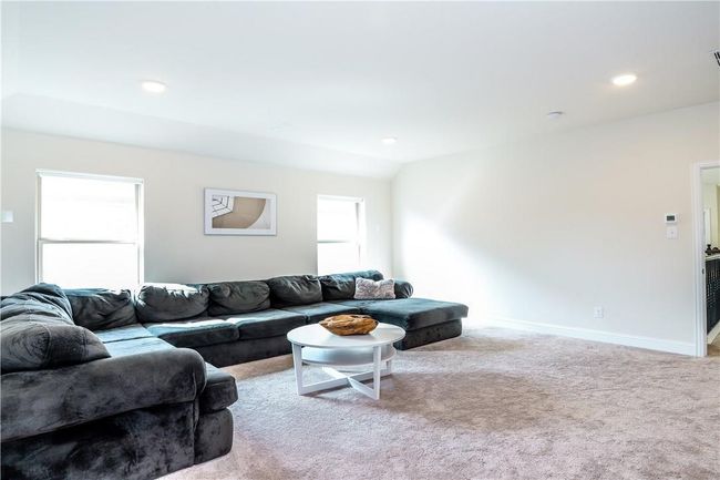 Living area with carpet floors and recessed lighting | Image 20