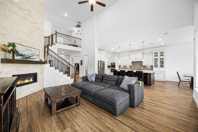 Gorgeous modern fireplace that ties in to the home finishes. | Image 21