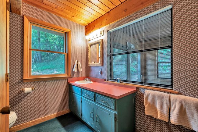 main level bath accessed from hall and bedroom | Image 27