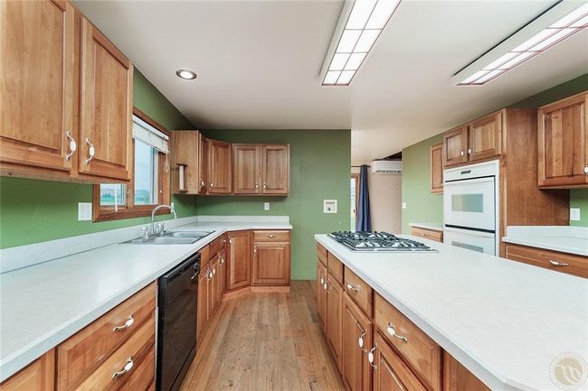 Kitchen w cherry cabinets | Image 5