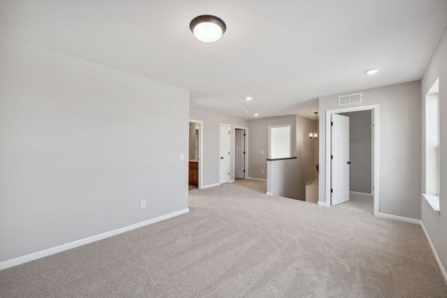 Three bedrooms, loft, laundry and two baths make up the upper level! | Image 15