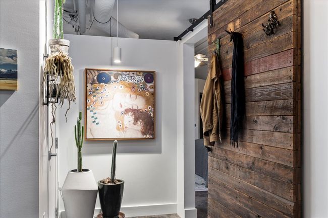Hall featuring a barn door | Image 18