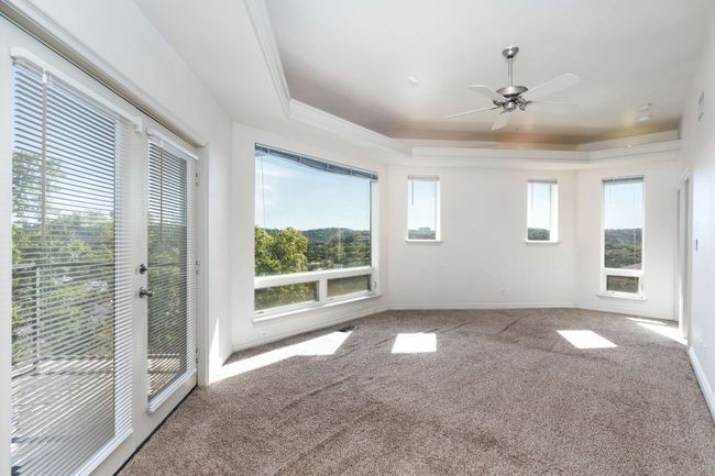Bedroom with custom ceiling and lighting and amazing views. | Image 13