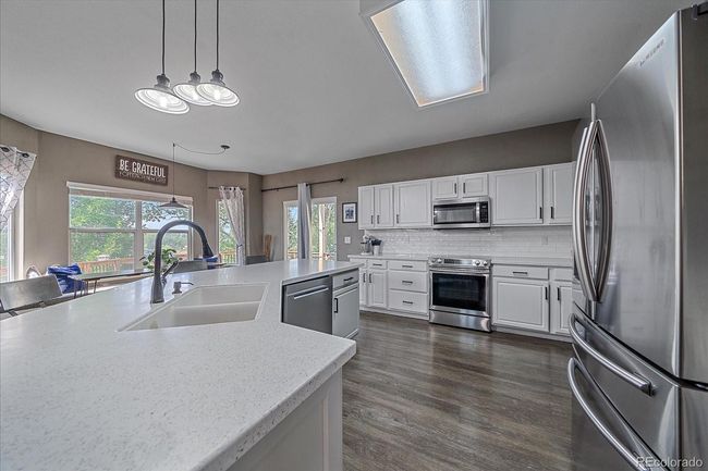 21680 Longs Peak Ln, House other with 4 bedrooms, 4 bathrooms and 3 parking in Parker CO | Image 19