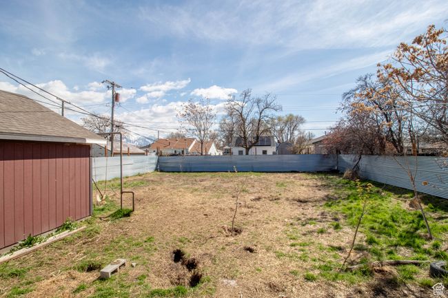 View of yard with a fenced backyard | Image 18