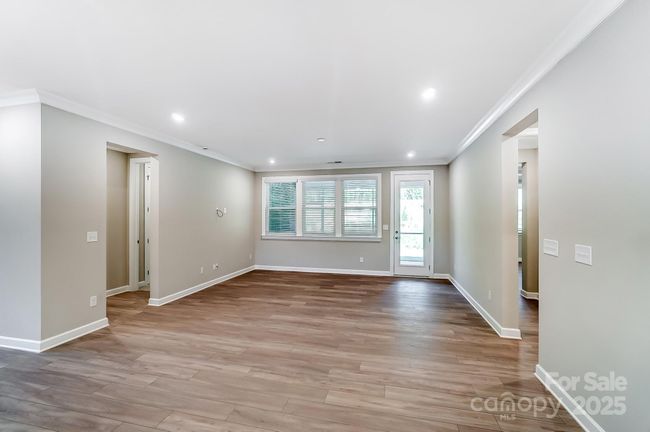 Gathering Room with View of Screened Porch-Photo similar to Subject Property | Image 6