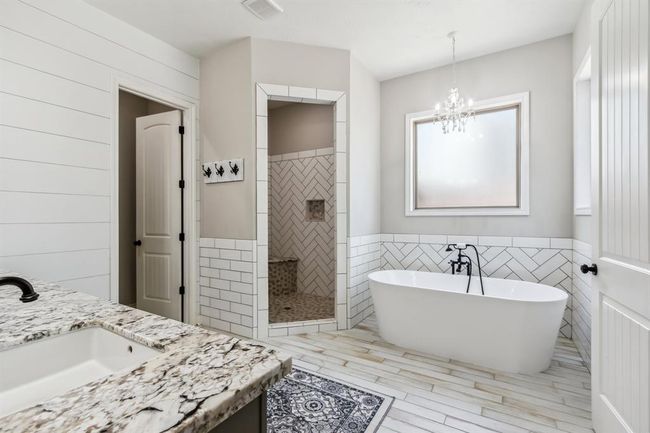 Envision yourself melting away the day's stress in this beautiful soaking tub. | Image 20
