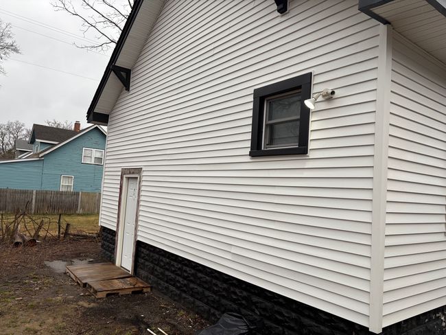 Plenty of Space for a Patio at the Rear of House | Image 16