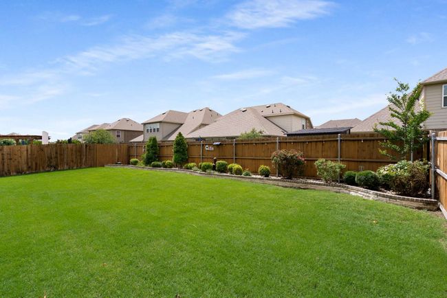 View of yard with a residential view | Image 23