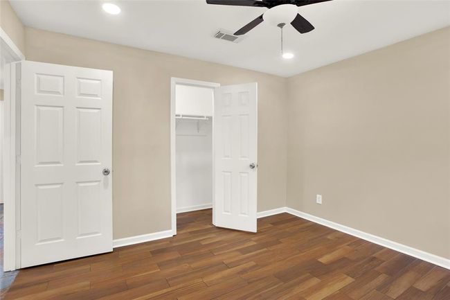 bedroom 3 has a great LED lighted closet... as all of them do after the remodel. | Image 25