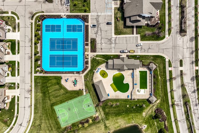 Amenities include multiple swimming pools, a fitness/workout center, playgrounds, a 15-acre park, dog park, racquet courts, a clubhouse w/ banquet facilities, miles of biking and walking paths and more! | Image 46
