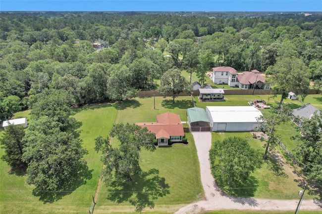 Property Begins at right edge of the driveway. | Image 46
