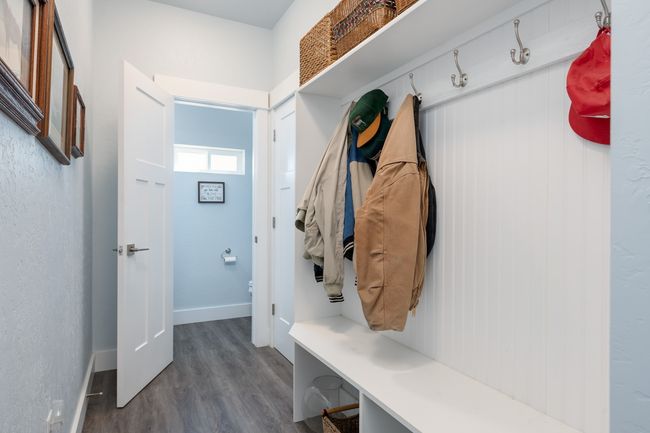 Step from garage to mud-room and powder/guest bath (3rd bathroom) | Image 23