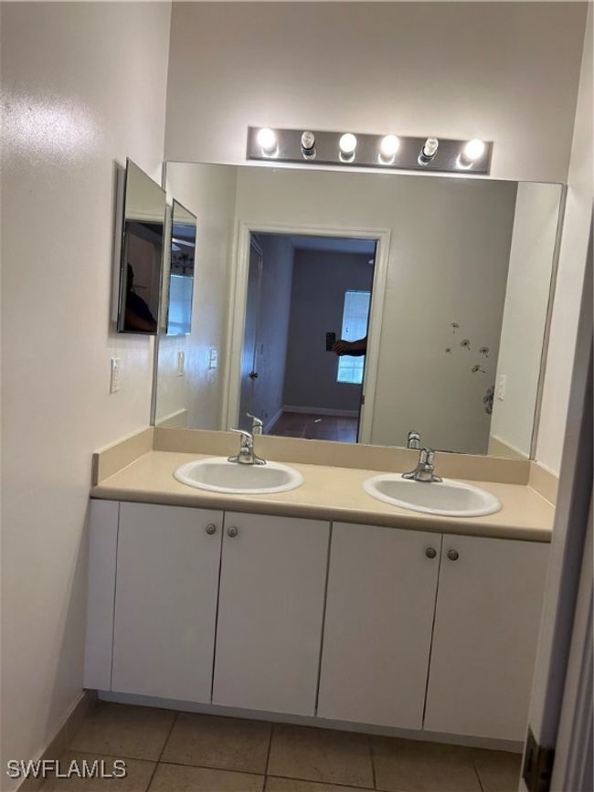 Bathroom featuring vanity and tile patterned flooring | Image 13